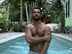 Hot strigous guy relating to the pool and shower